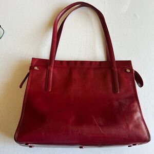 Monsac vintage shoulder bag crafted from ox red leather